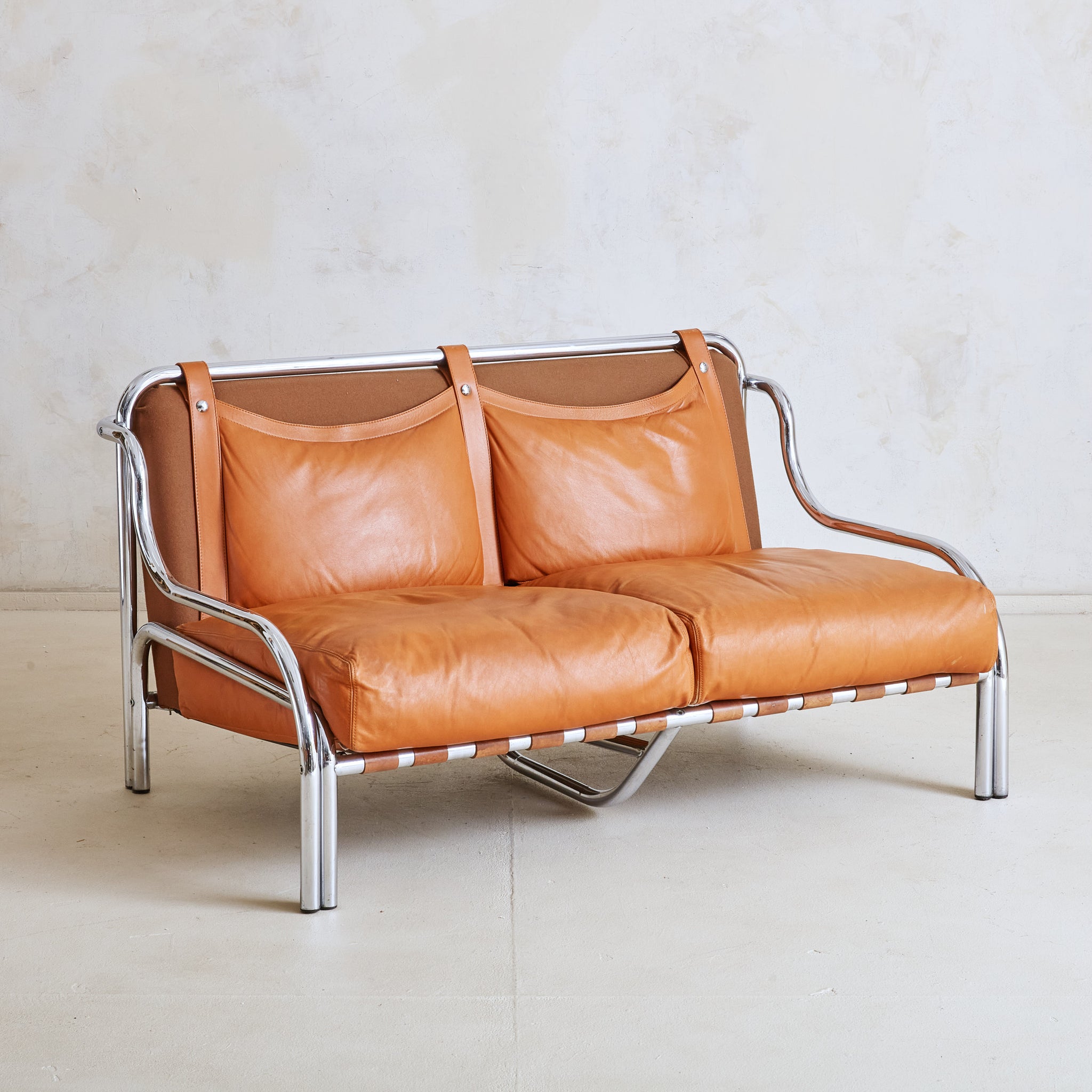 Stringa' Cognac Leather + Chrome Loveseat by Gae Aulenti for Poltrono